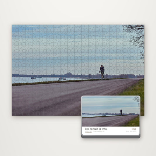 Bike Against de Waal – 1000-piece cycling jigsaw puzzle and branded gift tin, A Man of Steel by Ryan Edy