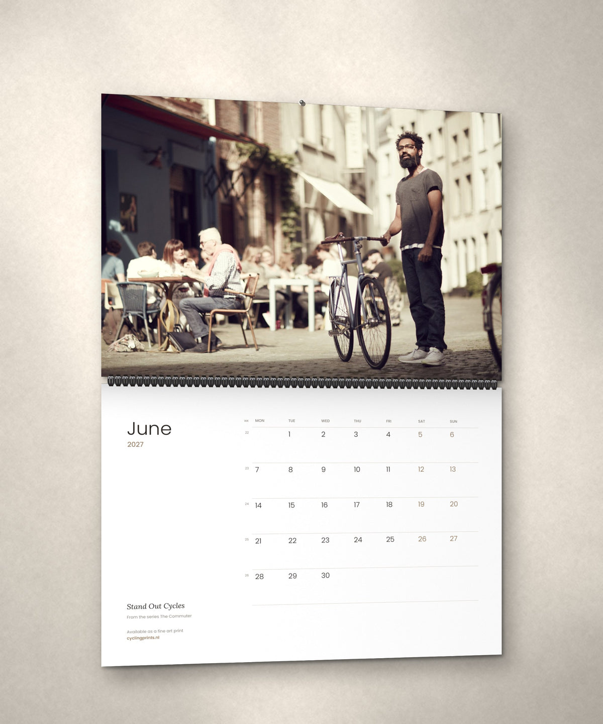 June 2027 – Stand Out Cycles, a page from The Commuter cycling photography wall calendar by Ryan Edy