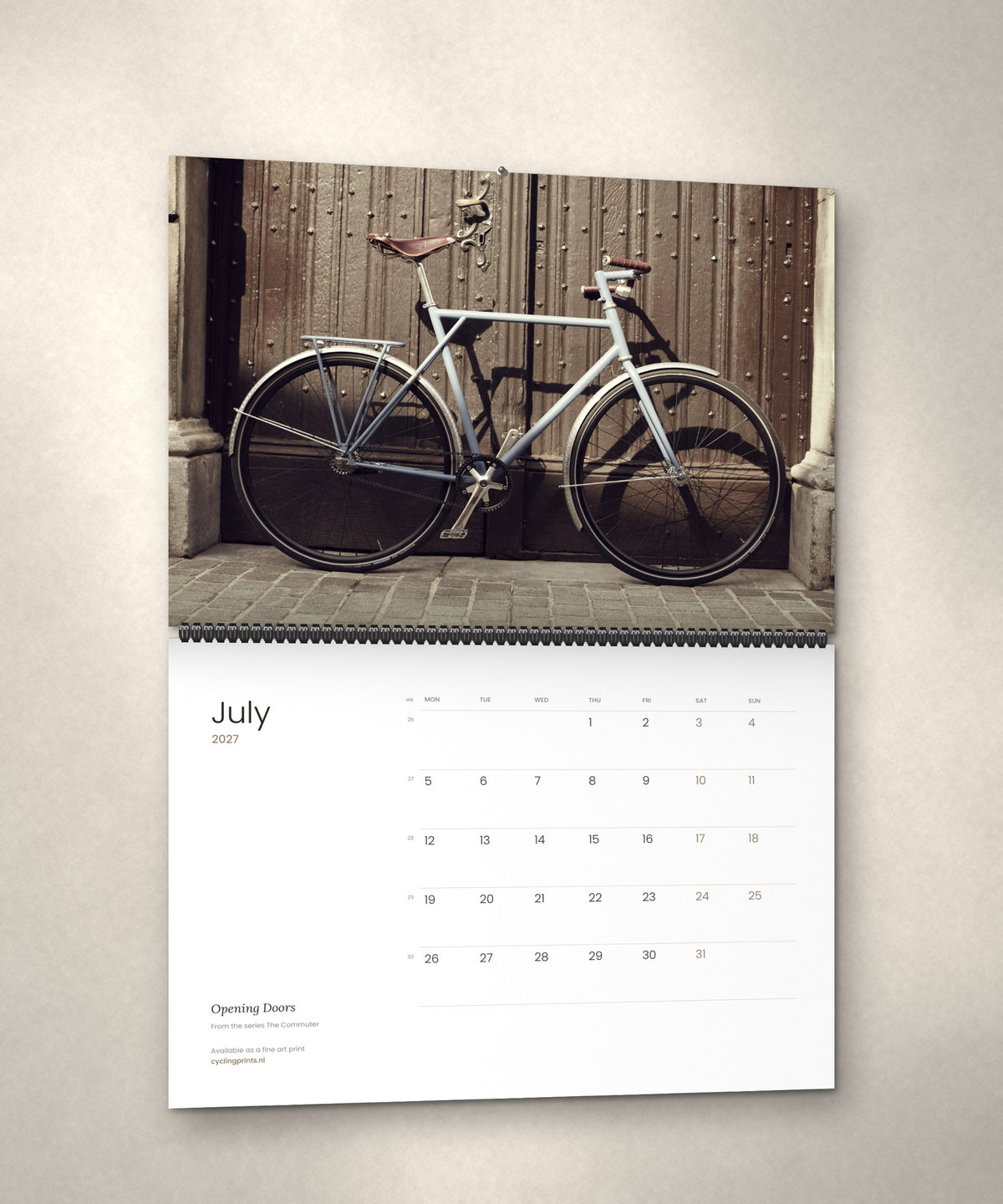 July 2027 – Opening Doors, a page from The Commuter cycling photography wall calendar by Ryan Edy