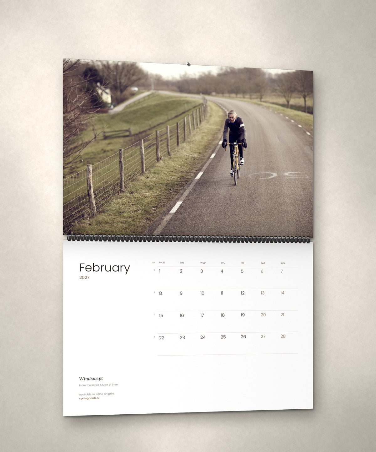 February 2027 – Windswept, a page from the A Man of Steel cycling photography wall calendar by Ryan Edy