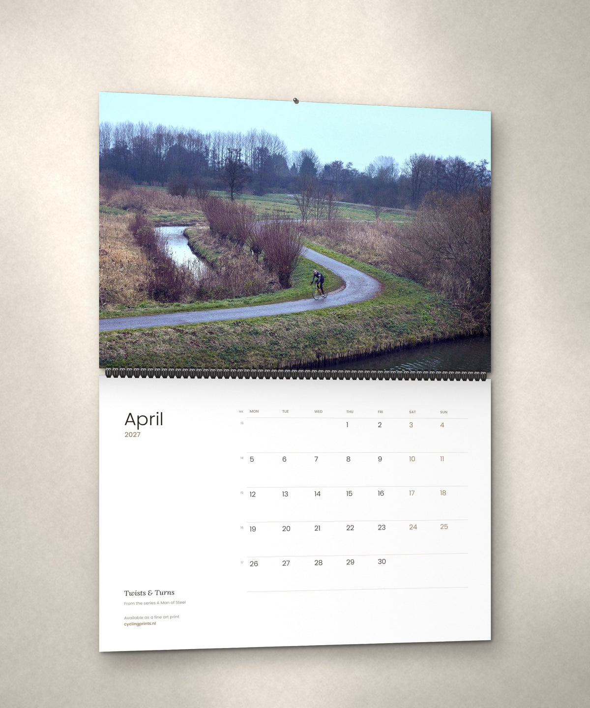 April 2027 – Twists & Turns, a page from the A Man of Steel cycling photography wall calendar by Ryan Edy