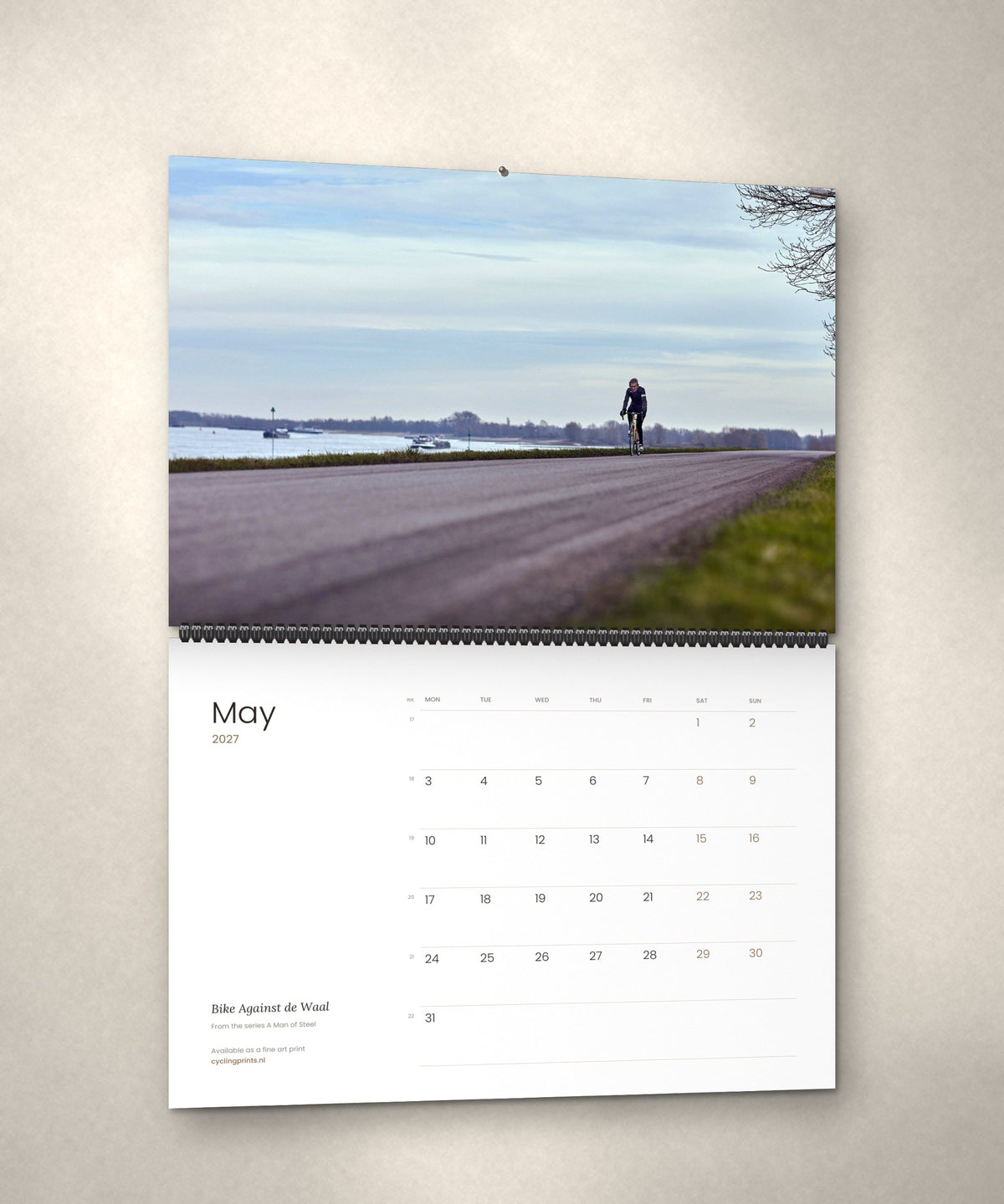 May 2027 – Bike Against de Waal, a page from the A Man of Steel cycling photography wall calendar by Ryan Edy