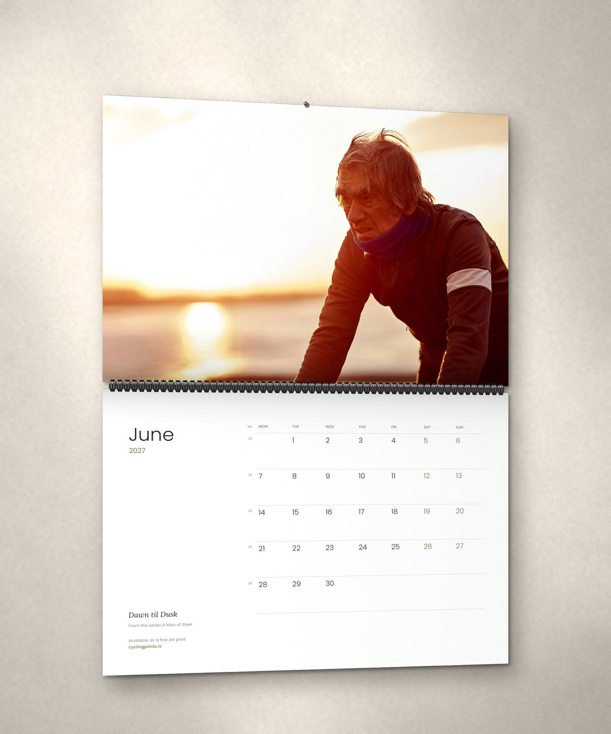 June 2027 – Dawn til Dusk, a page from the A Man of Steel cycling photography wall calendar by Ryan Edy