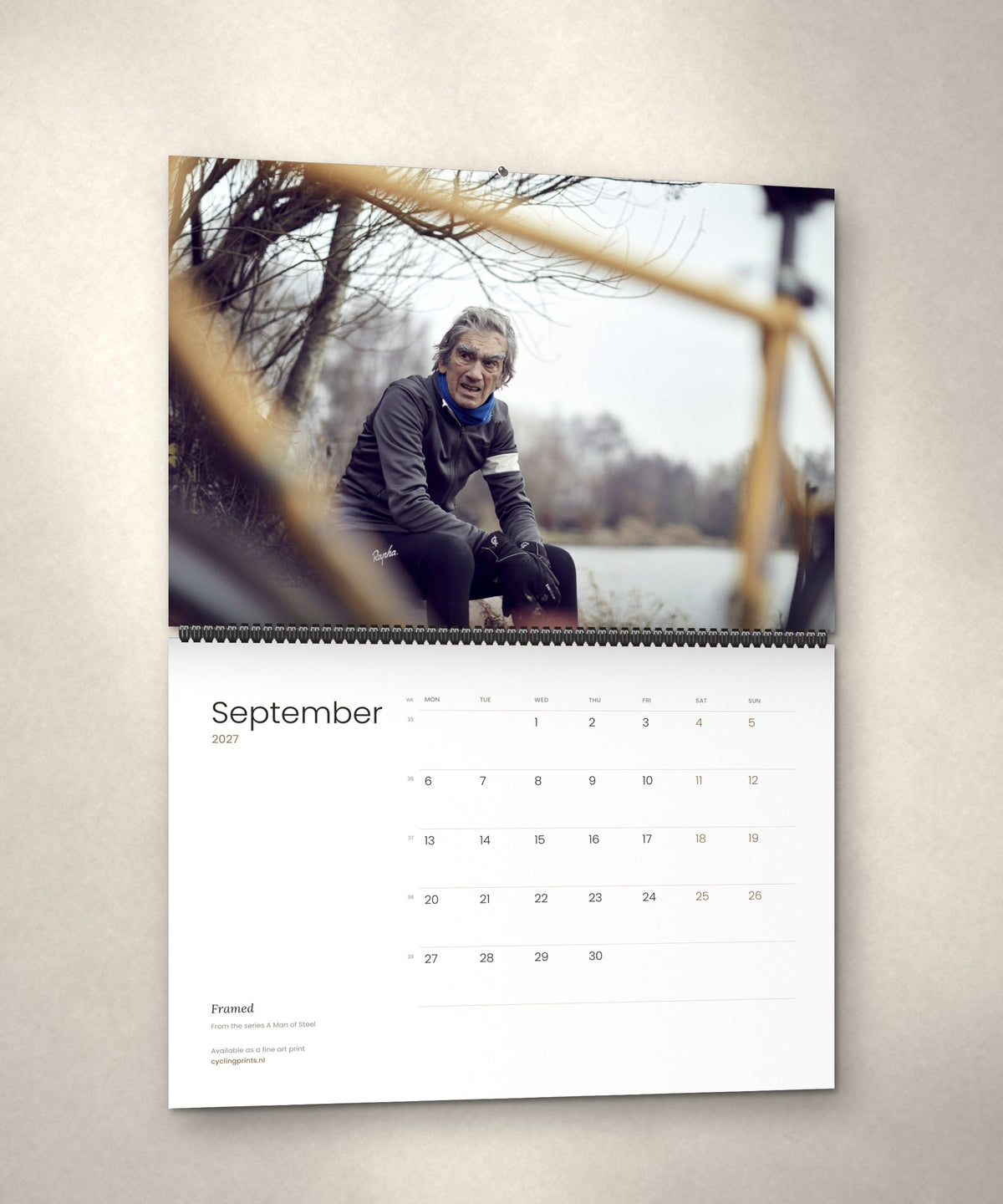 September 2027 – Framed, a page from the A Man of Steel cycling photography wall calendar by Ryan Edy