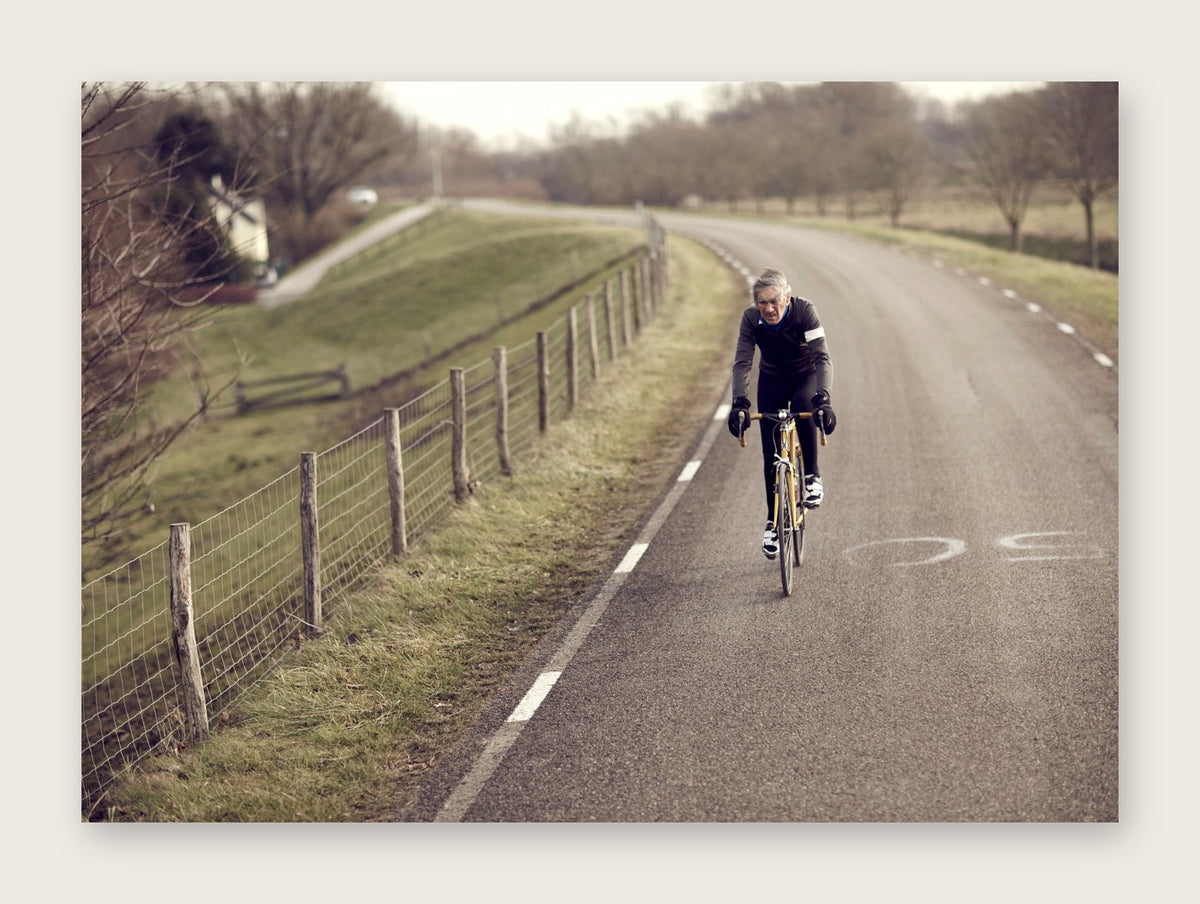 Windswept – A Man of Steel fine art cycling greeting card by Ryan Edy