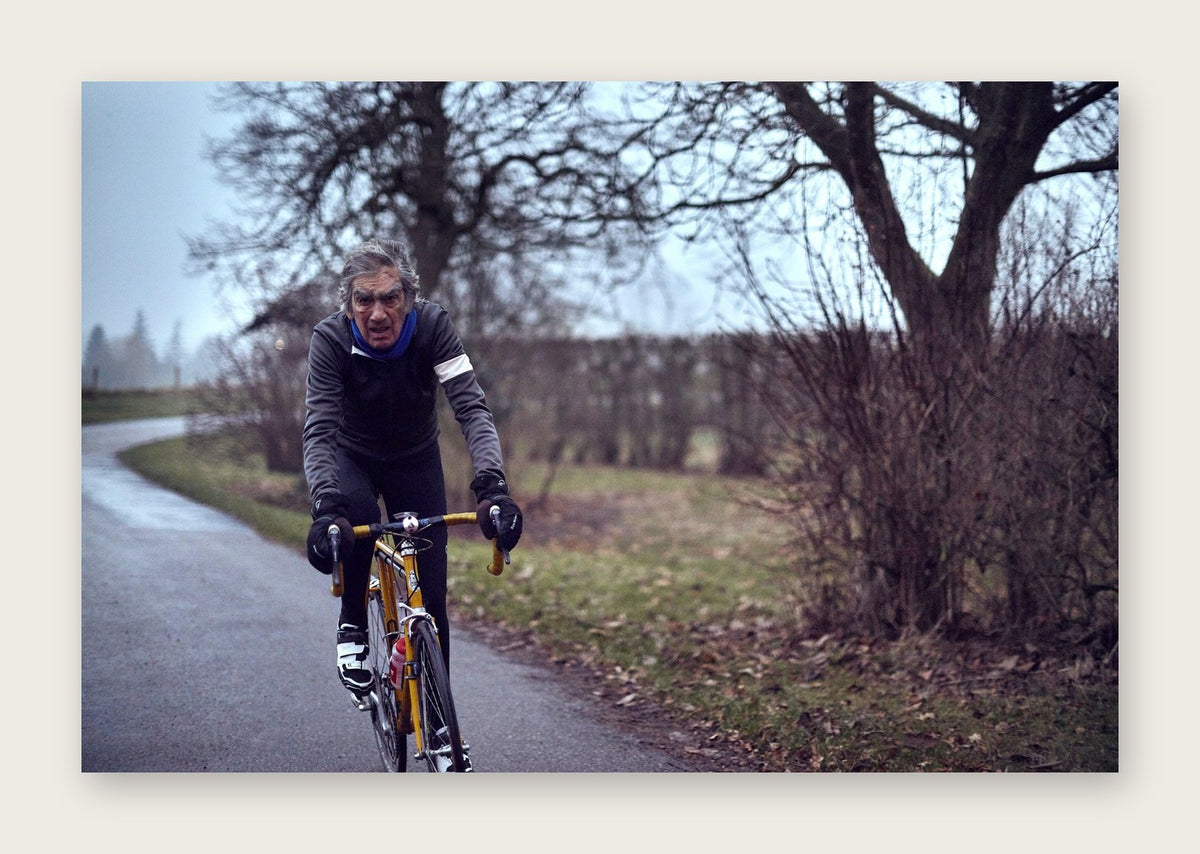 Round the Bend – A Man of Steel fine art cycling postcard by Ryan Edy