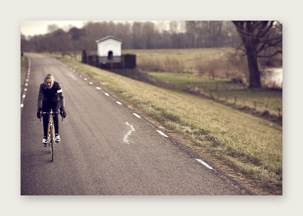 Bike the Dike – A Man of Steel fine art cycling postcard by Ryan Edy