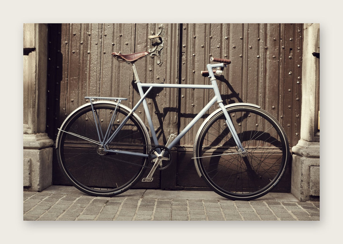Opening Doors – The Commuter fine art cycling postcard by Ryan Edy
