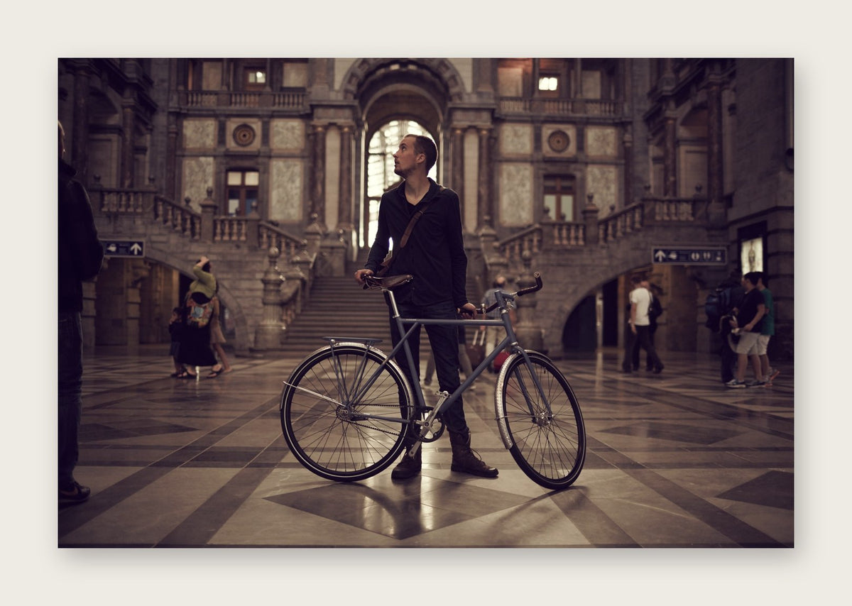 The Arrival – The Commuter fine art cycling postcard by Ryan Edy